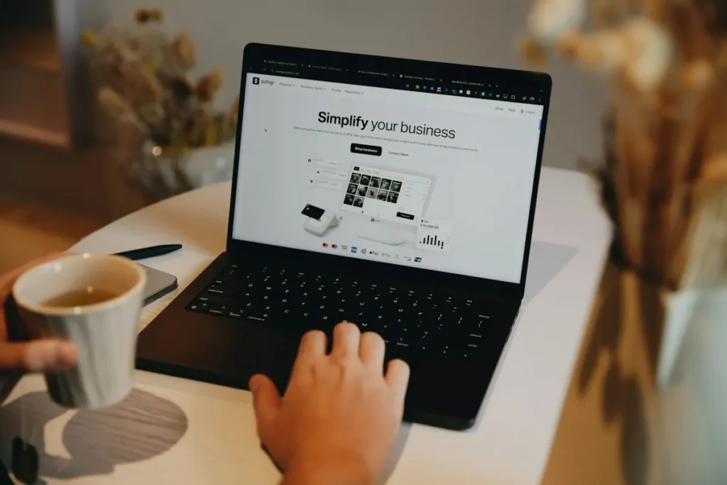 Small business owner planning digital marketing strategies on a laptop