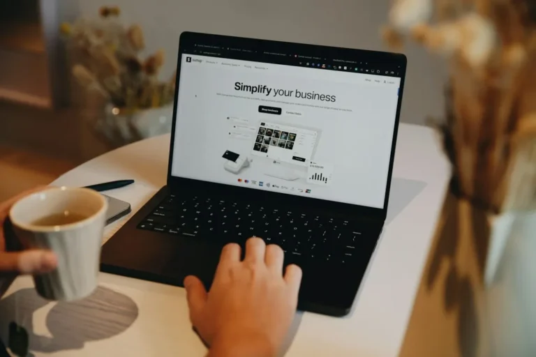 Small business owner planning digital marketing strategies on a laptop